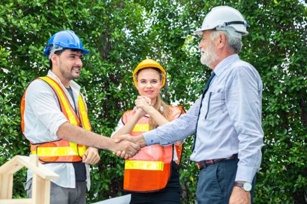 Professional tree service team discussing project details with homeowner after tree trimming job in Beachwood, OH
